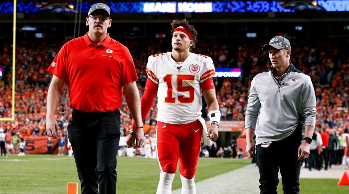 Oct 17, 2019; Denver, CO, USA; Kansas City Chiefs quarterback Patrick Mahomes (15) walks off the field after a play in the second quarter against the Denver Broncos at Empower Field at Mile High. Mandatory Credit: Isaiah J. Downing-USA TODAY Sports